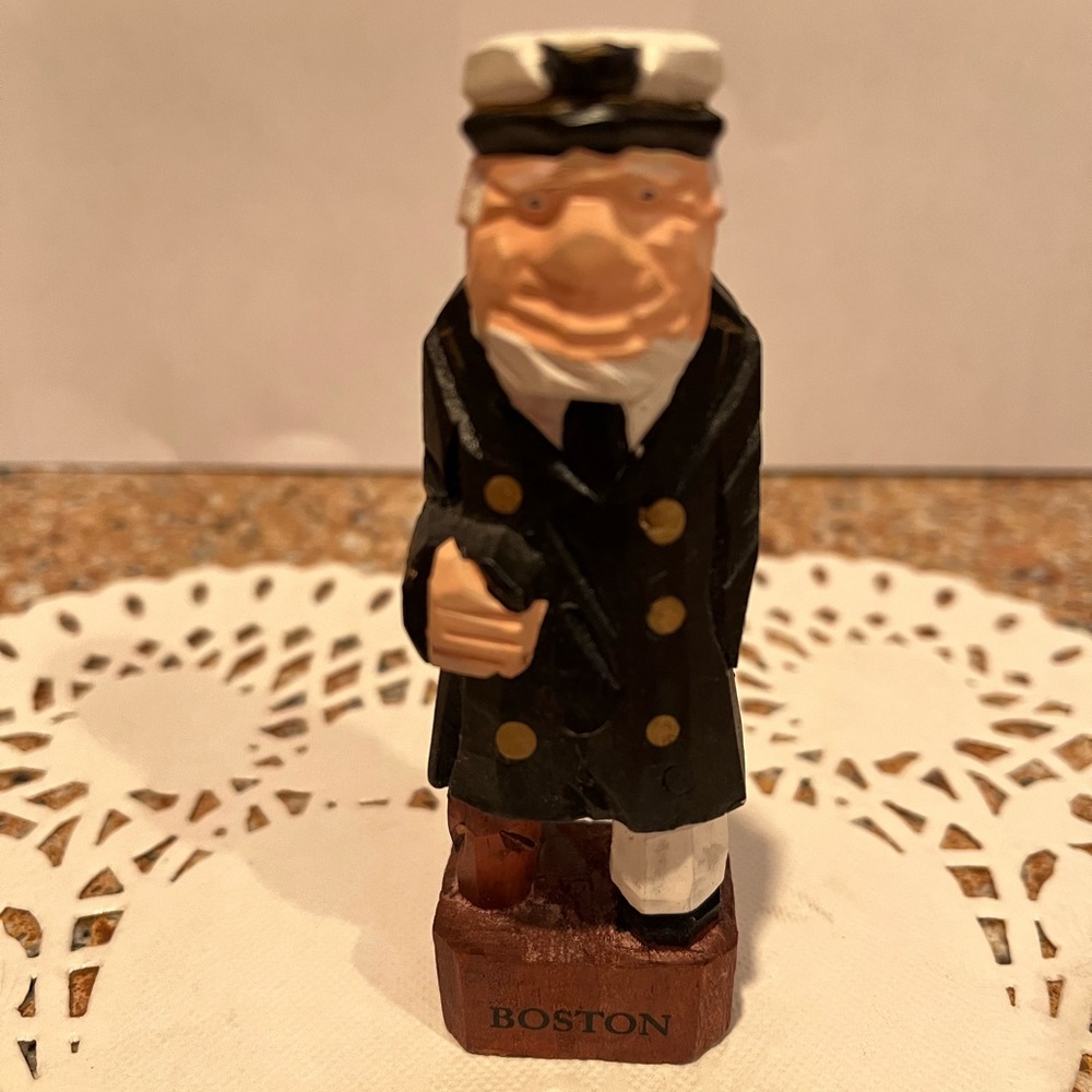 Hand carved sea captain w/ wooden leg.  4 1/4” tall from Boston